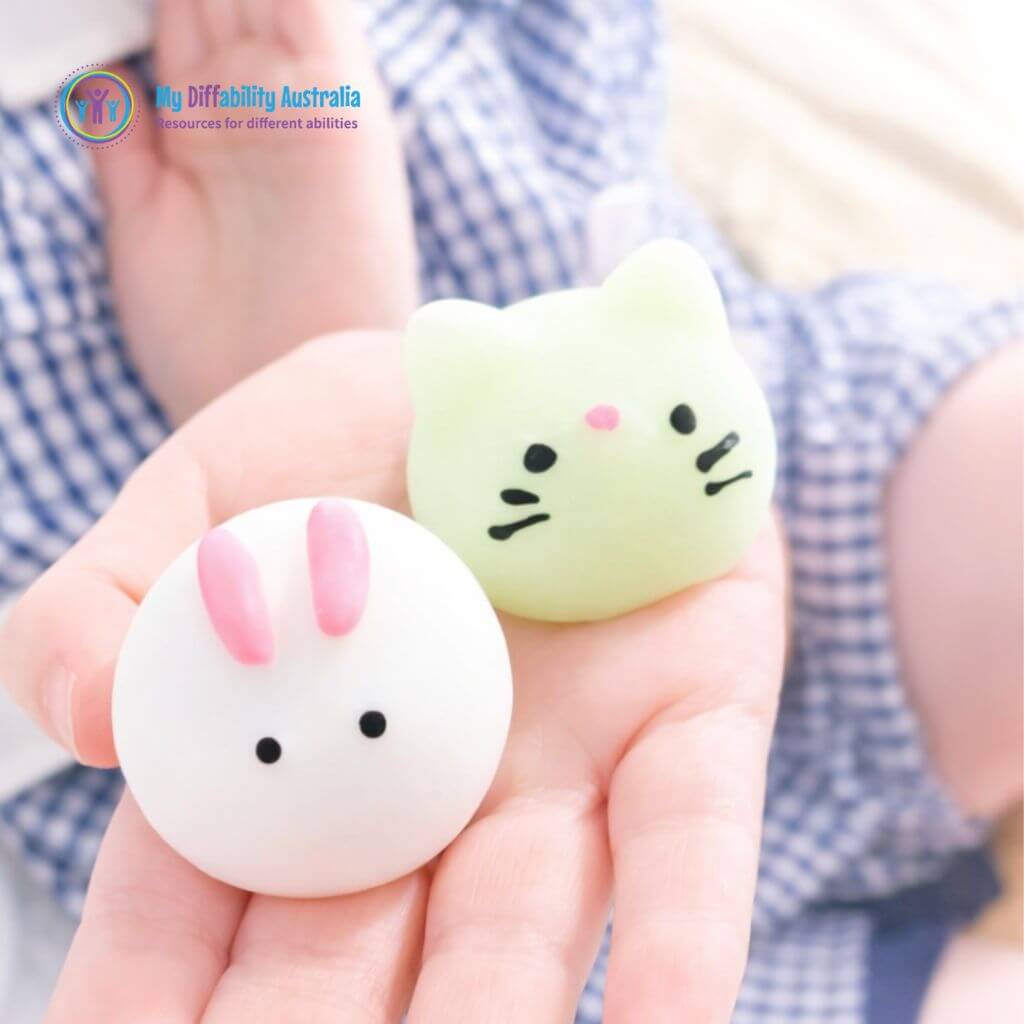 2 Animal Squishies in a kids hand