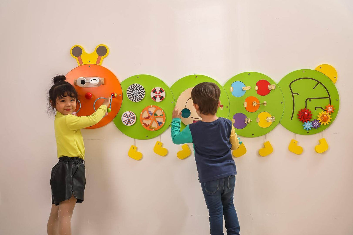 2 Kids Playing Caterpillar Wall Game