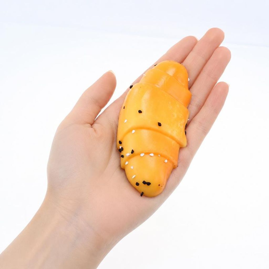 Bread Roll Squishy in a palm