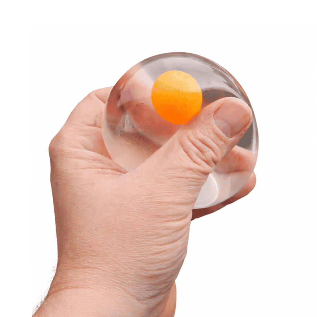 Close up photo of a hand Splatter Egg Squeezy Ball