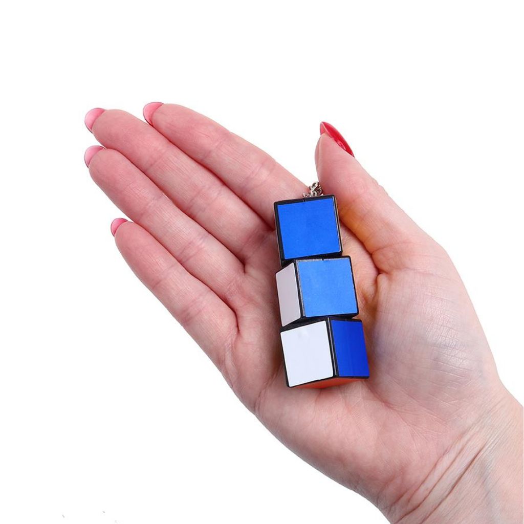 Fidget Keychain Twist placed in a palm
