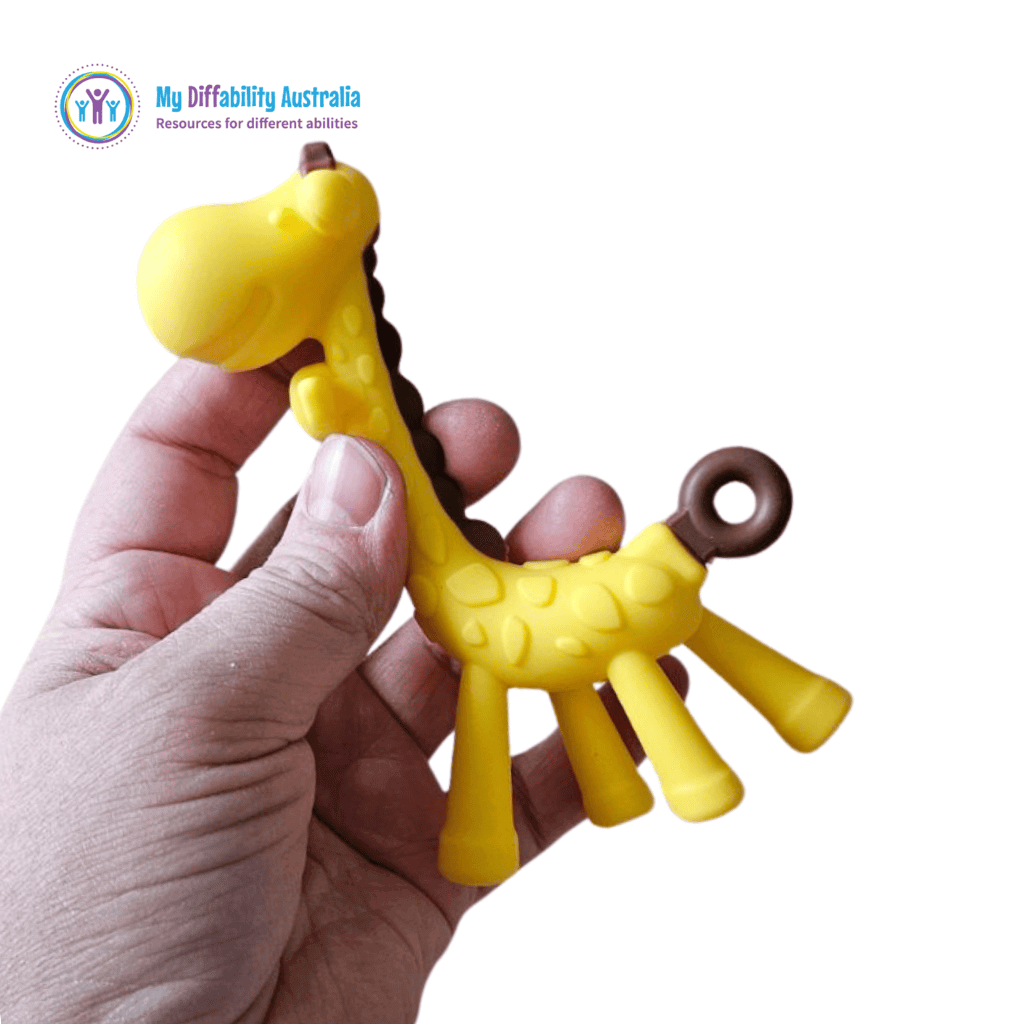 Giraffe Teether in ones palm