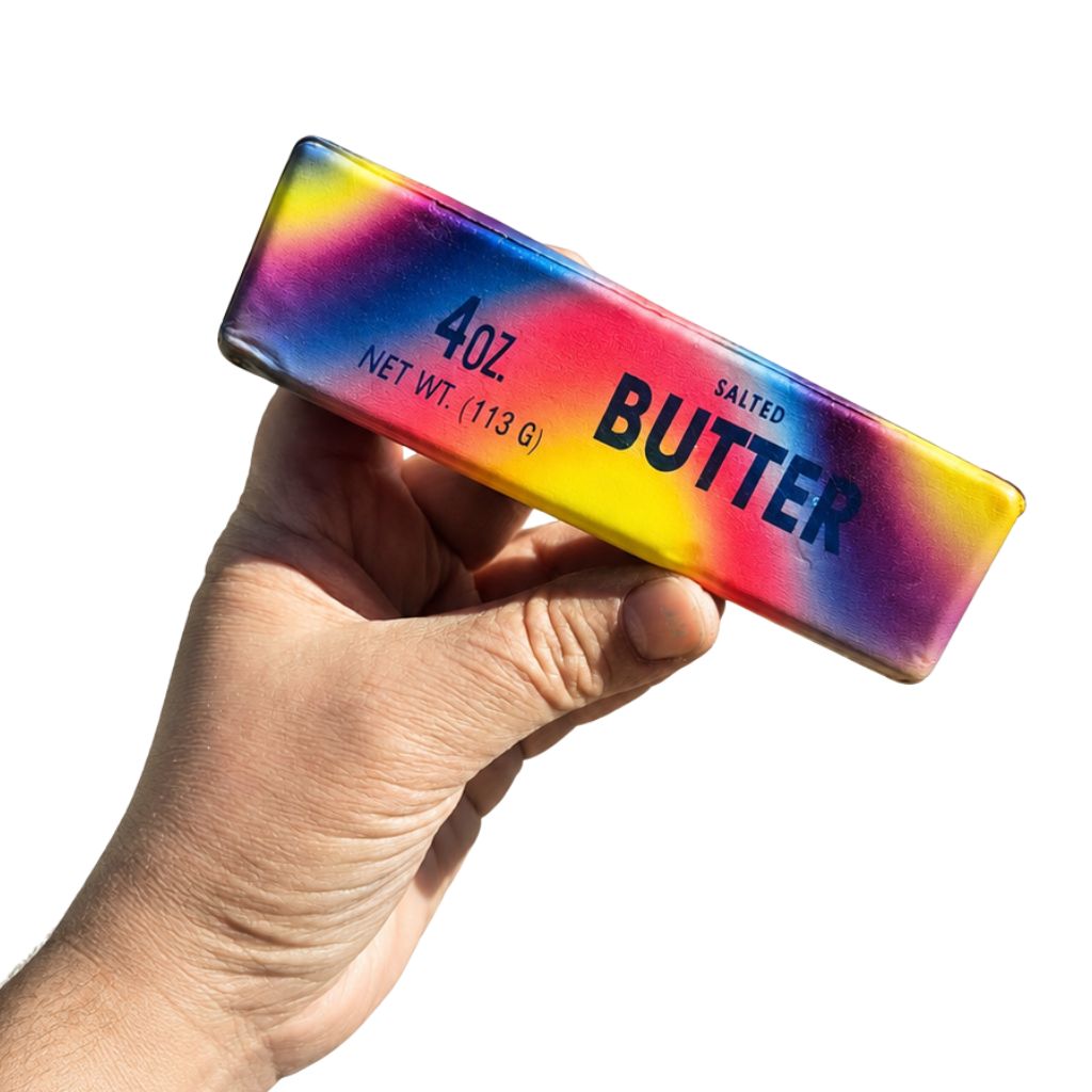Hand Holding Butter Sticks Rainbow