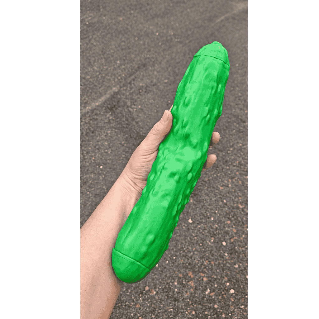 Hand Holding Giant Squeeze Pickle Squishy