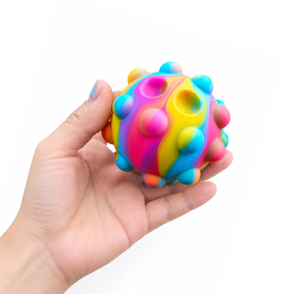 Hand Holding Pop It Fidget Ball