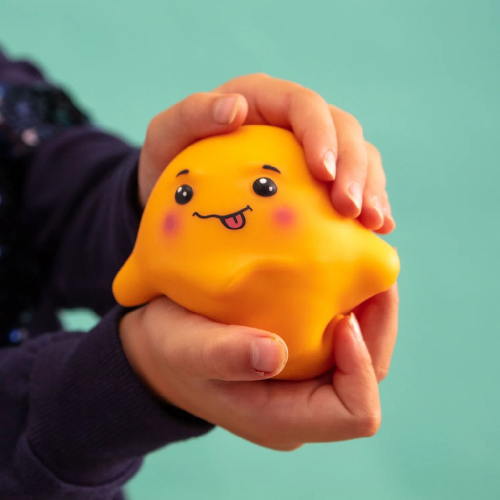 Kid Holding Boxer Gifts Stress Toy Jellysquish