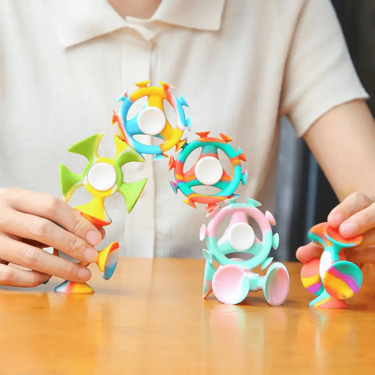 Kid Playing with Silicone Suction Cup Dart Sucker Toys