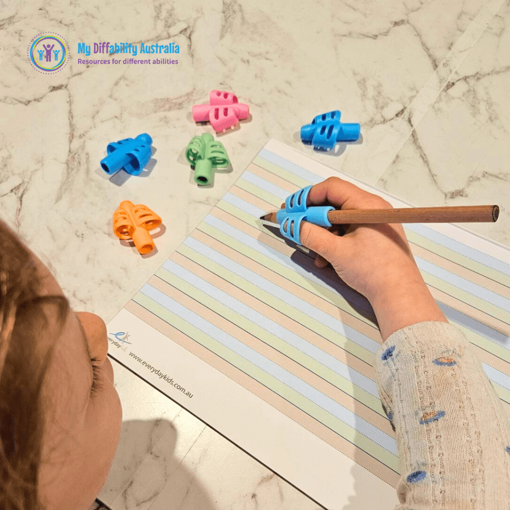 Kid Writing In the paper using two finger pencil grip