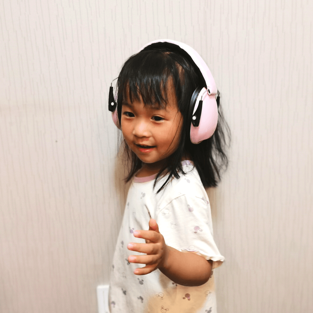 Light Pink Ear Muffs Worn by Little Girl