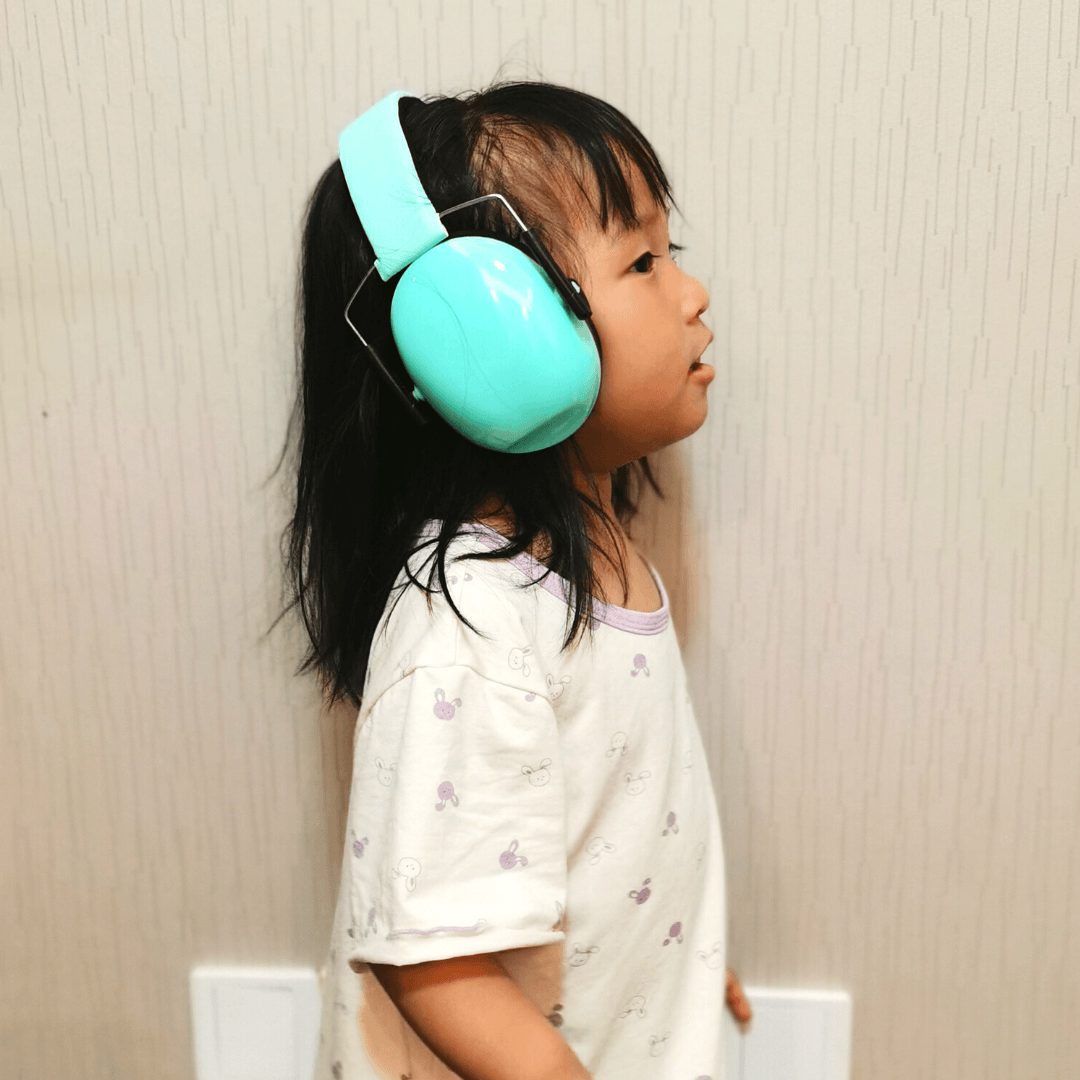 Mint Ear Muffs Worn by Little Girl Facing Right