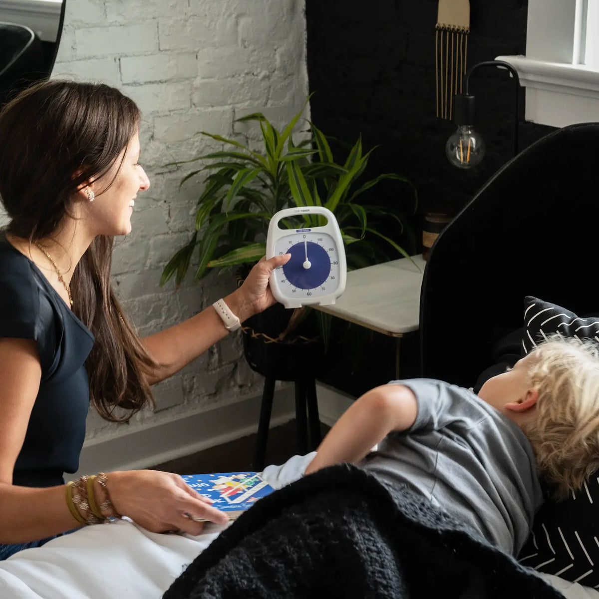 Mom Showing Time Timer Plus 120 Min to Her Kid