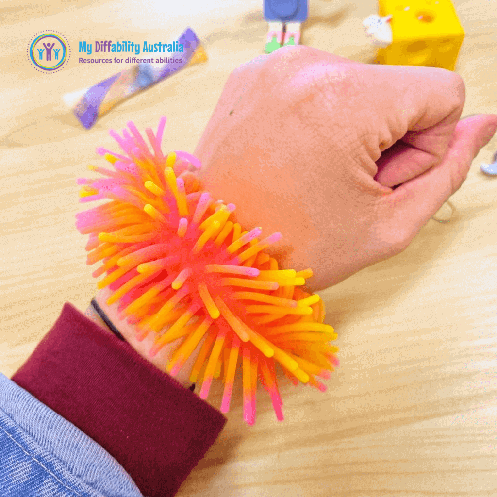 One Hand Wearing Two tone sensory wrist band