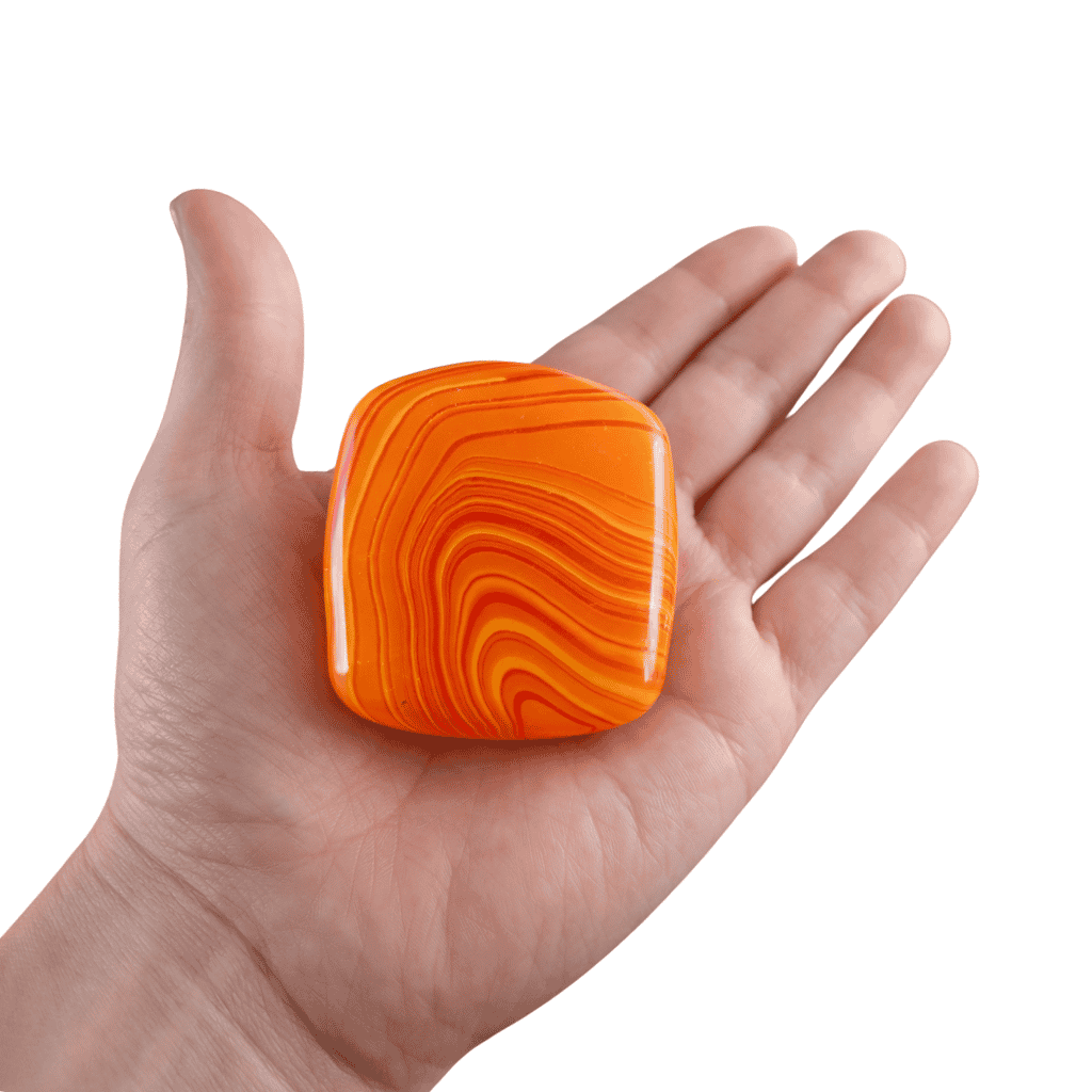 Orange Cube Squeeze Ball Placed In a hands palm