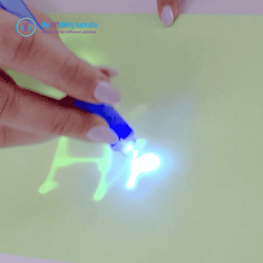 Picture of Light Up Drawing Board Showing the UV Pen Is Turned On