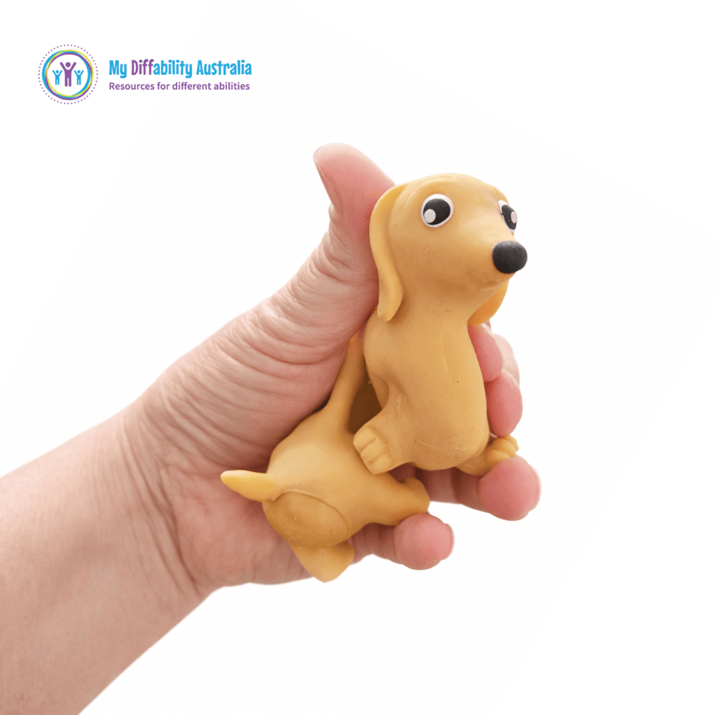 Picture of a hand holding Crunchy Stretchy Sausage Dog Fidget