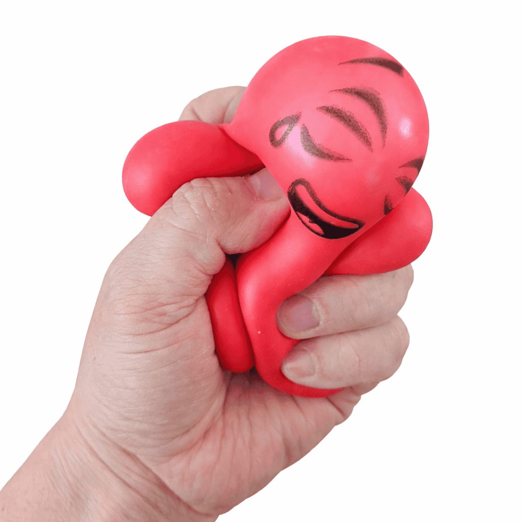 Picture of a hand squishing Red Splat Guy Stress Relieving Tool