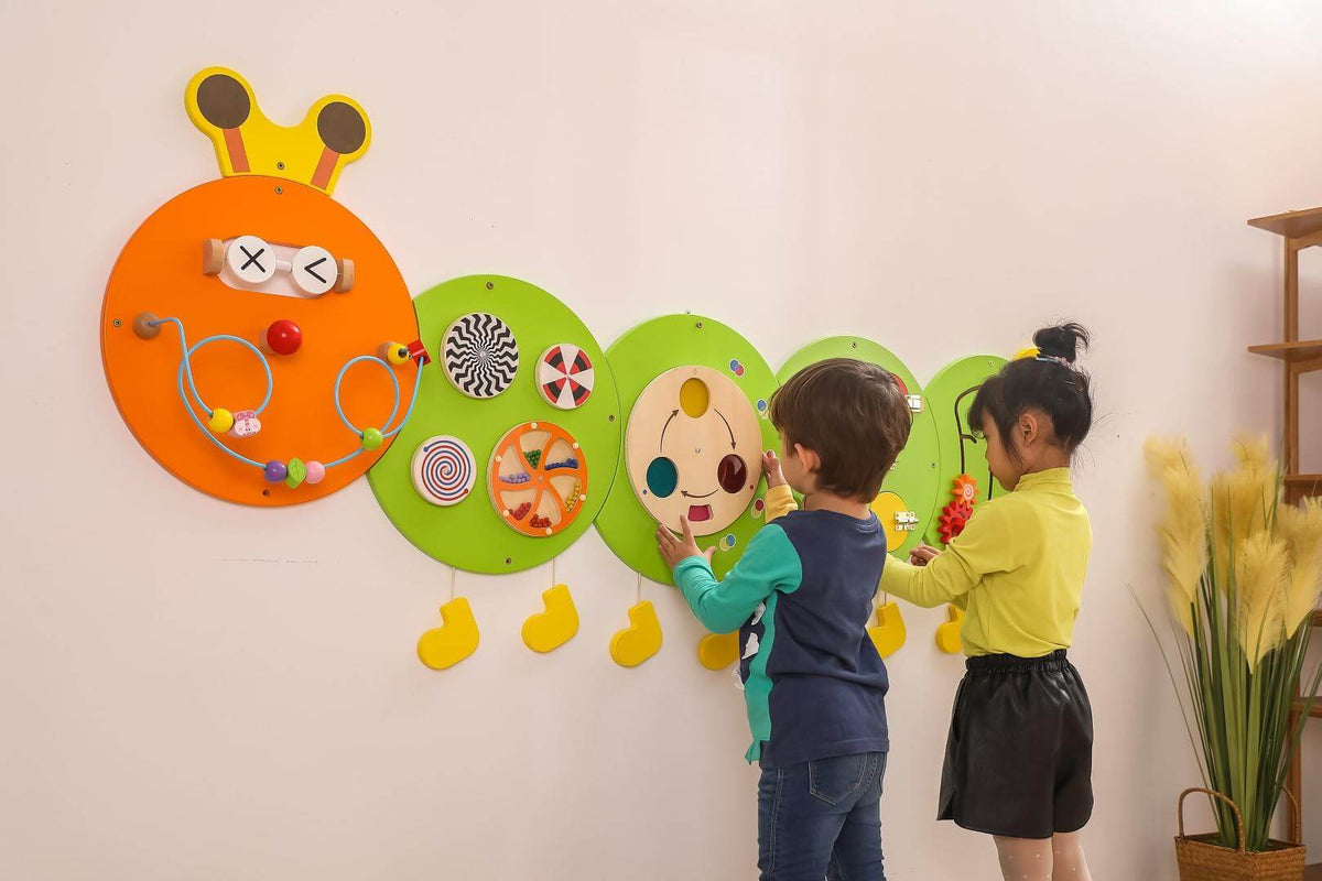 Playing with Caterpillar Wall Game