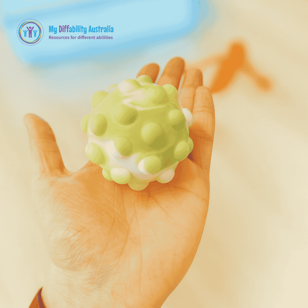 Pop It Fidget Ball Placed In One Hands Palm Zoom Out
