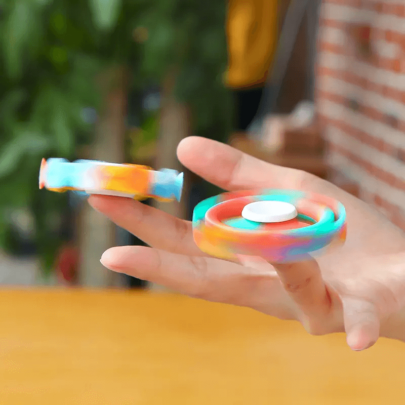 Small Silicone Suction Cup Dart Sucker Toys Being Played in Ones Hand