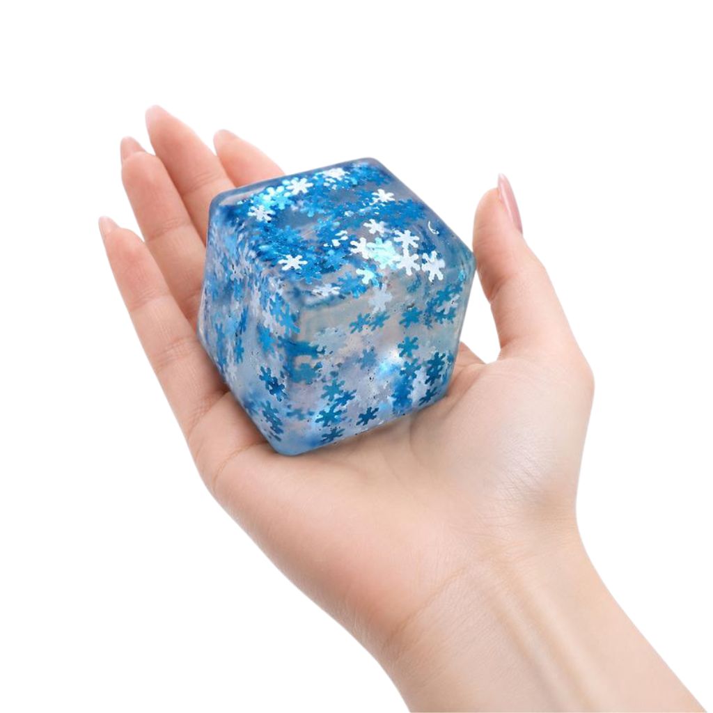 Squishy Squeeze Slow Rise Series Snow Flake Cube placed in a palm