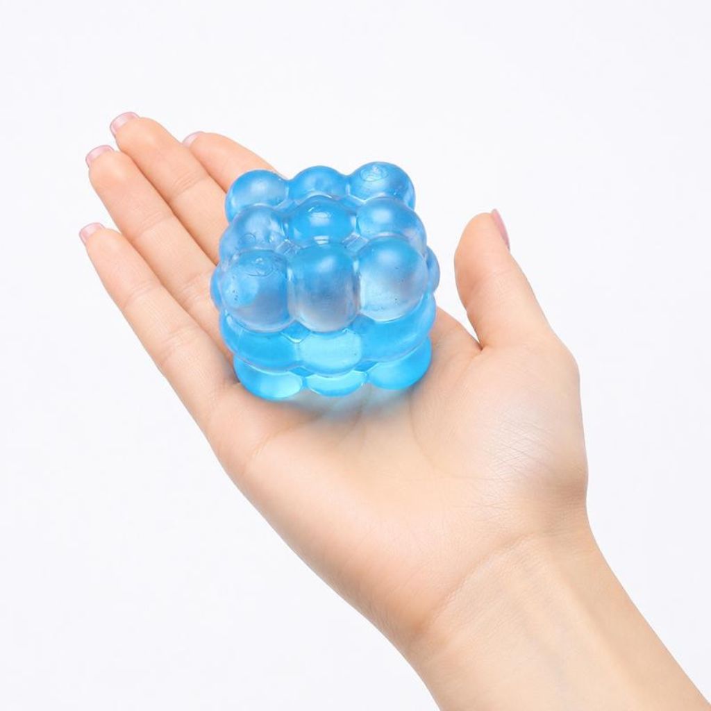 Squishy Squeeze Slow Rise Series cube bubble placed in a palm