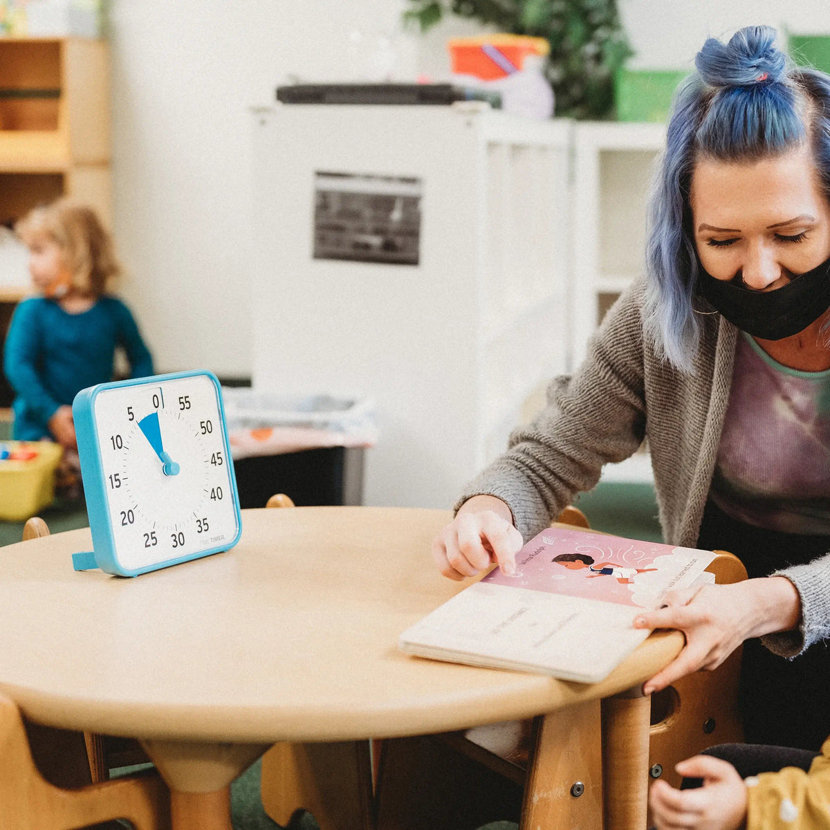 Teacher Using Time Timer 8 Learning Center Classroom Set