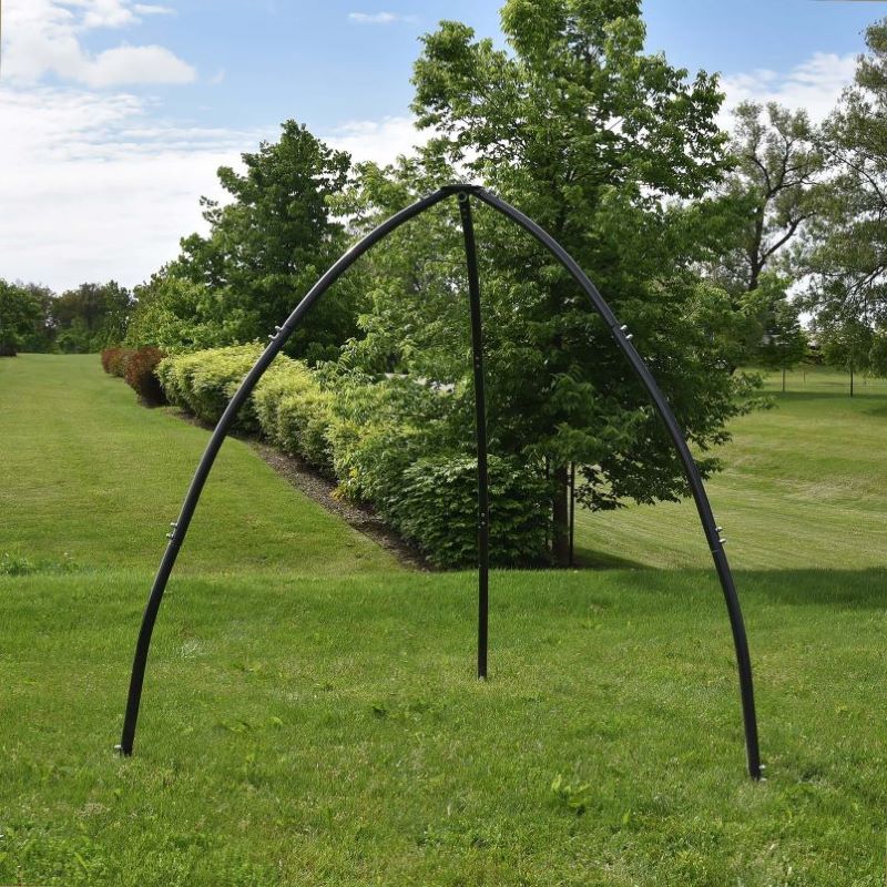 Tripod Hanging Chair Stand place out door with trees and green grass background