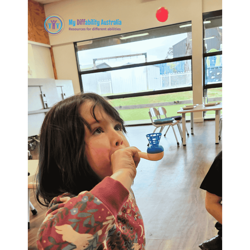 Young Girl Blowing the Magic Ball Blowing Pipe