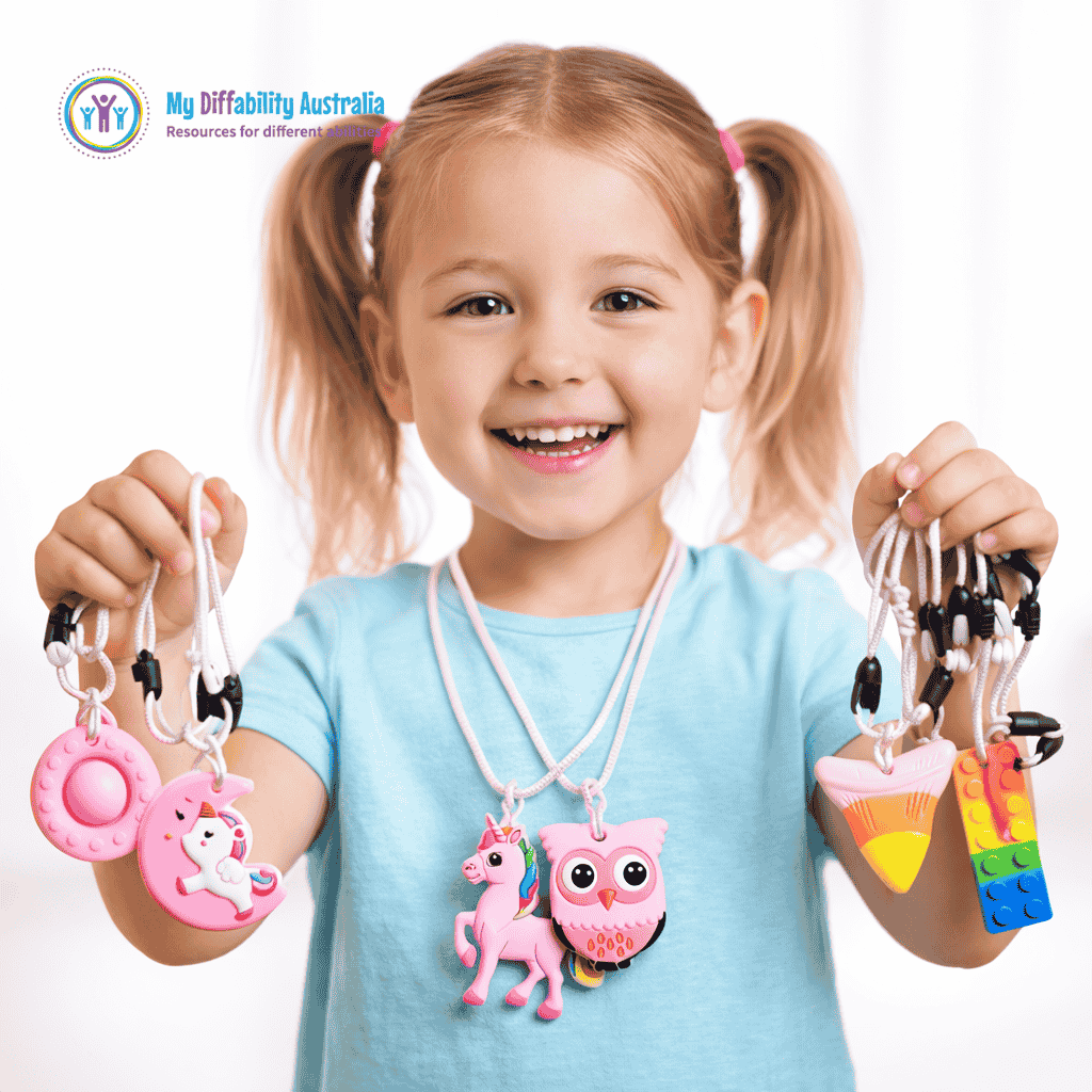 Young Girl Holding and Wearing Sensory Chew Variety Pack Set of 6 Pink