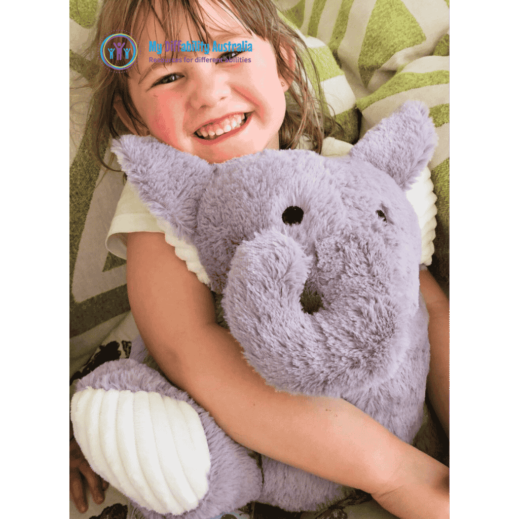Young Girl Hugging Elephant Weighted Toy
