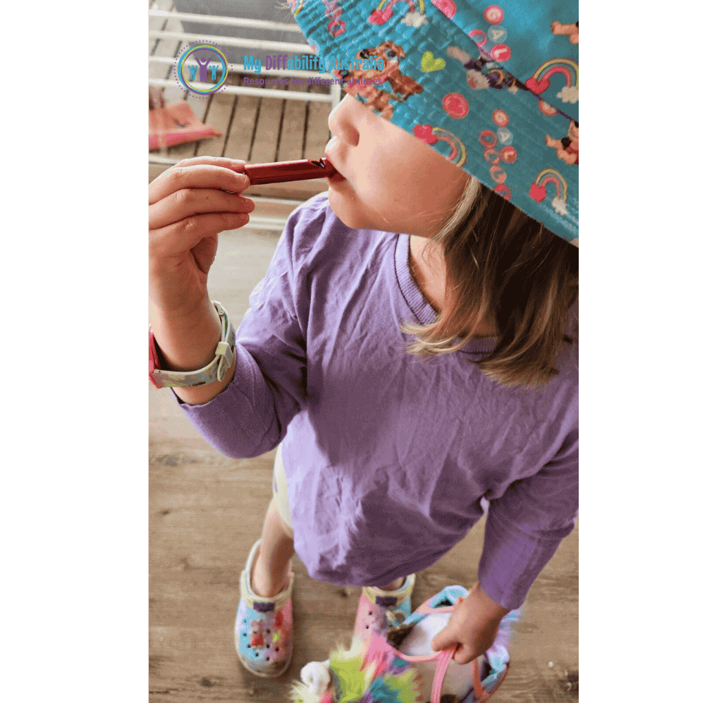 Young Girl Using Whistle Keychain Respiration Tool