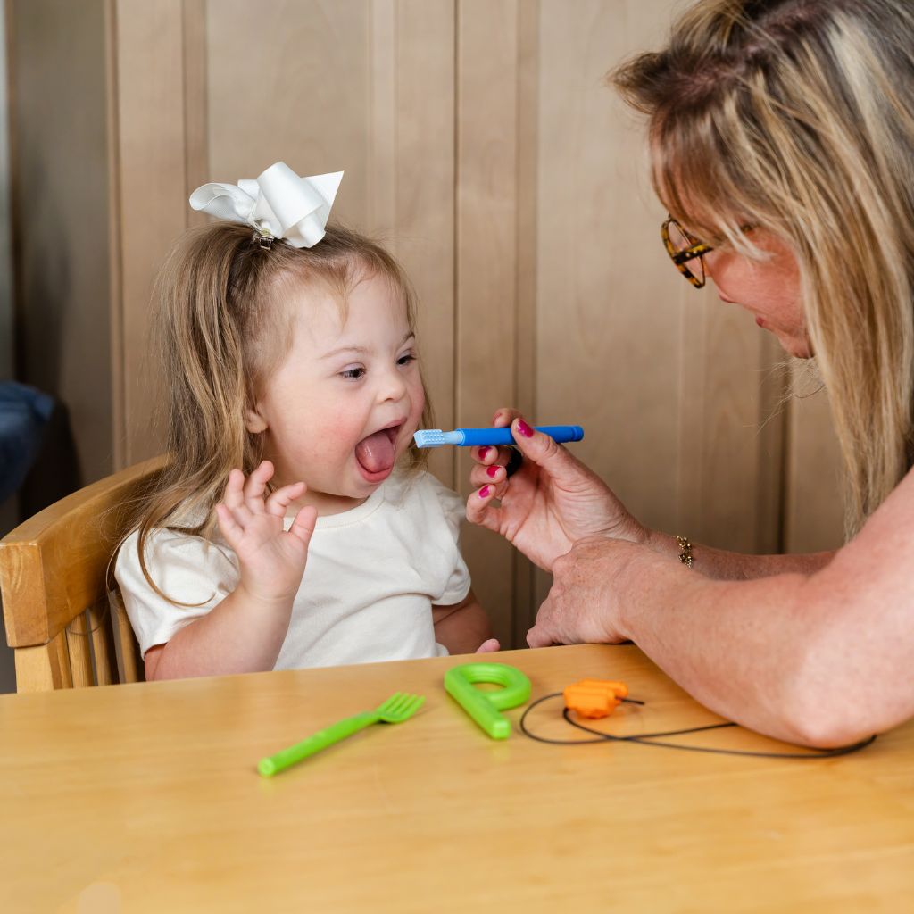 Young Girl with down syndrome about to use Ark z vibe handle