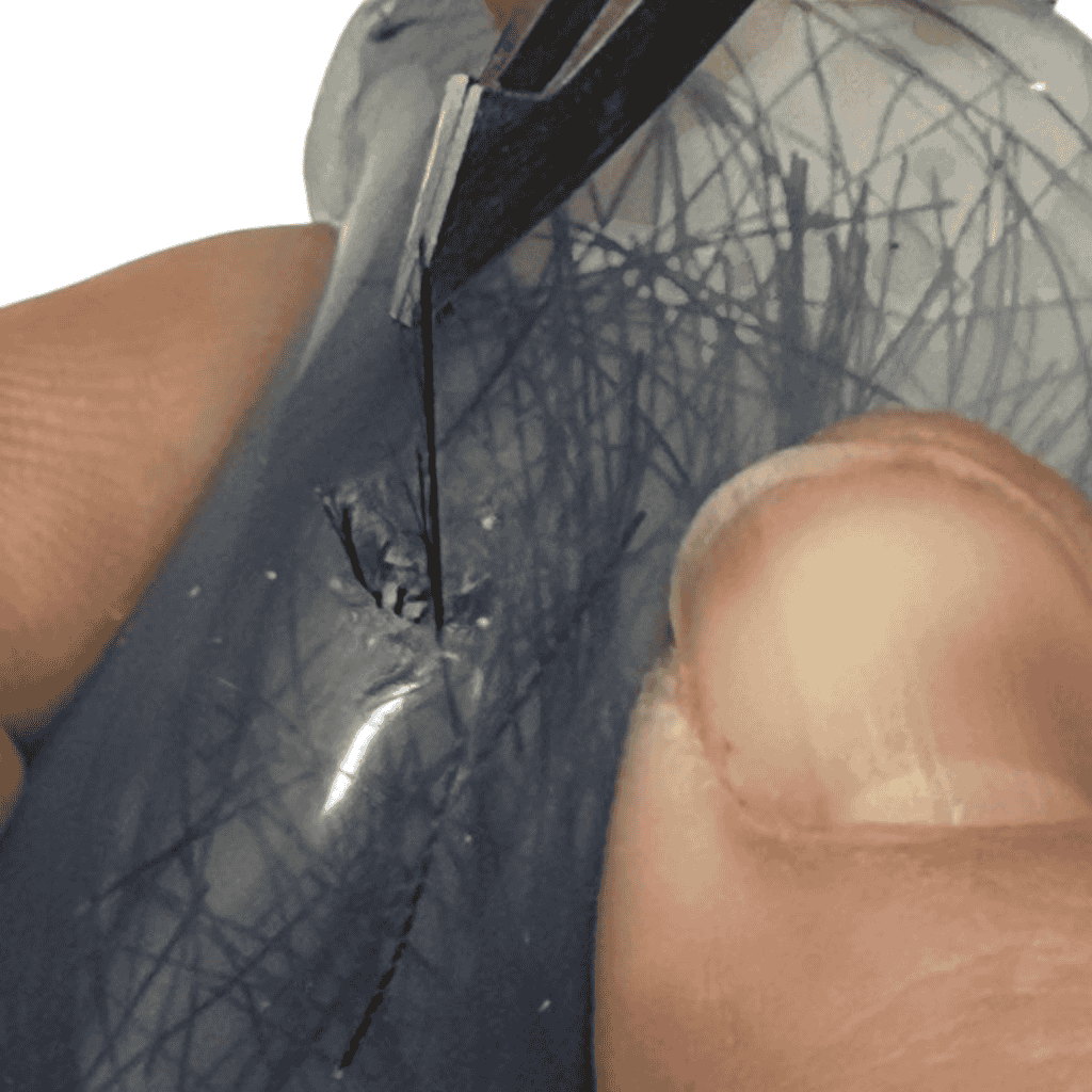 Zoom In View of Thread Pick Em Stack 3 Picking Hair Pulling Supports