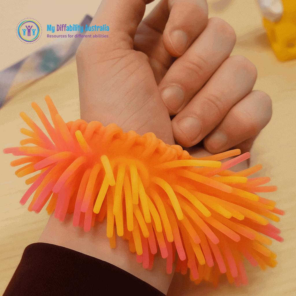 Zoom In View of Two tone sensory wrist band worn in a persons wrist