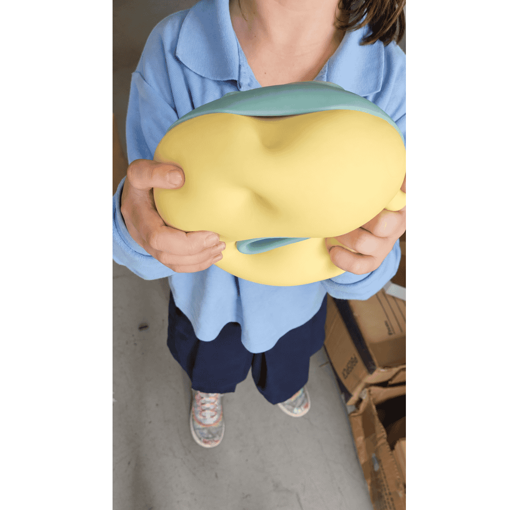 Zoom in View Holding Giant Donut Squishy