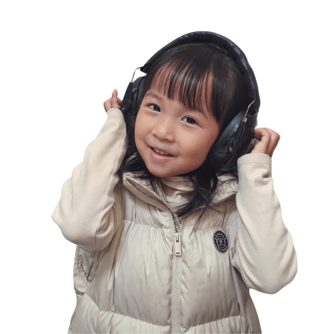 kid listening music using ear defender muffs