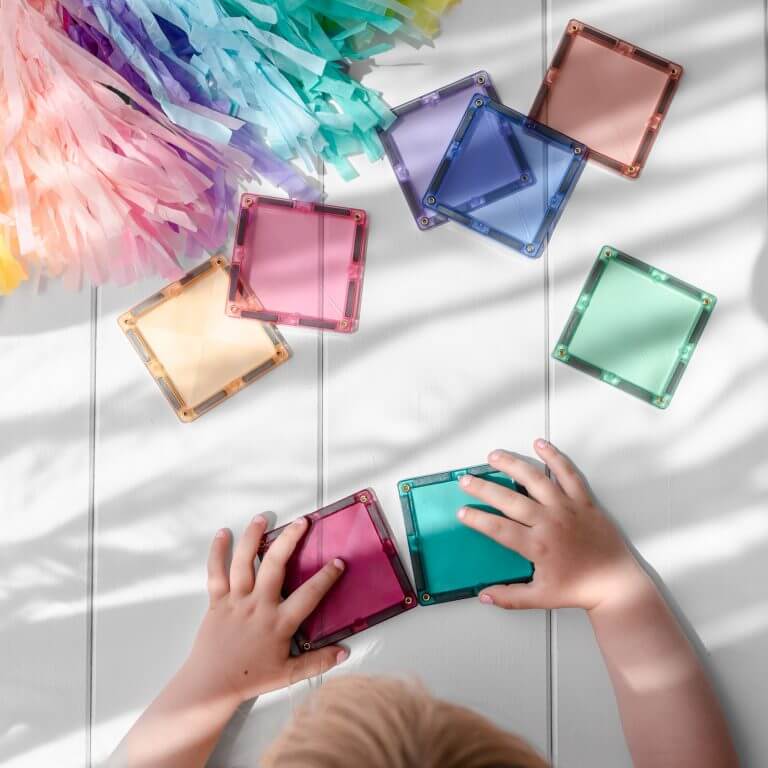 kid playing 120 piece pastel creative pack