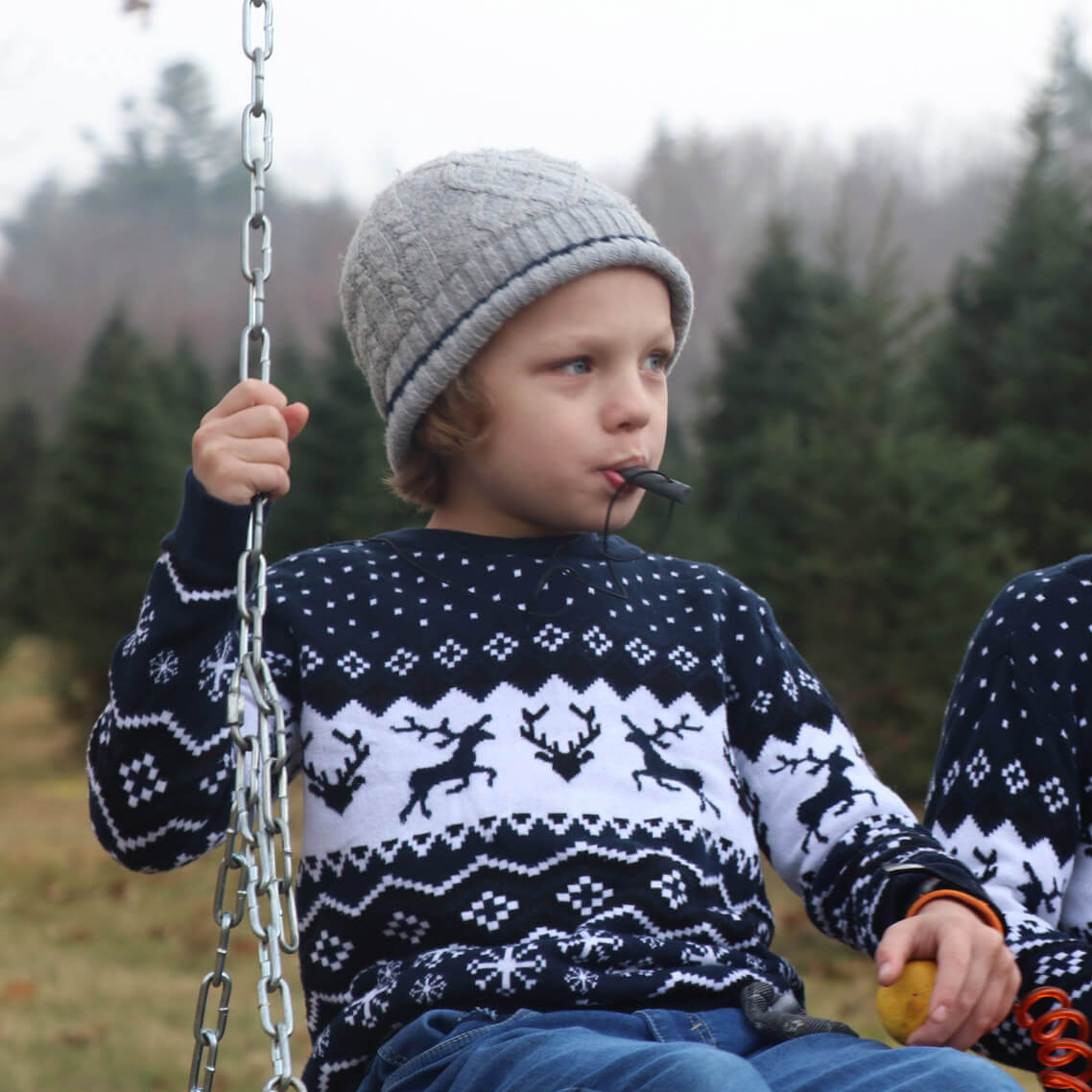 kid using bite tube hollow chew necklace