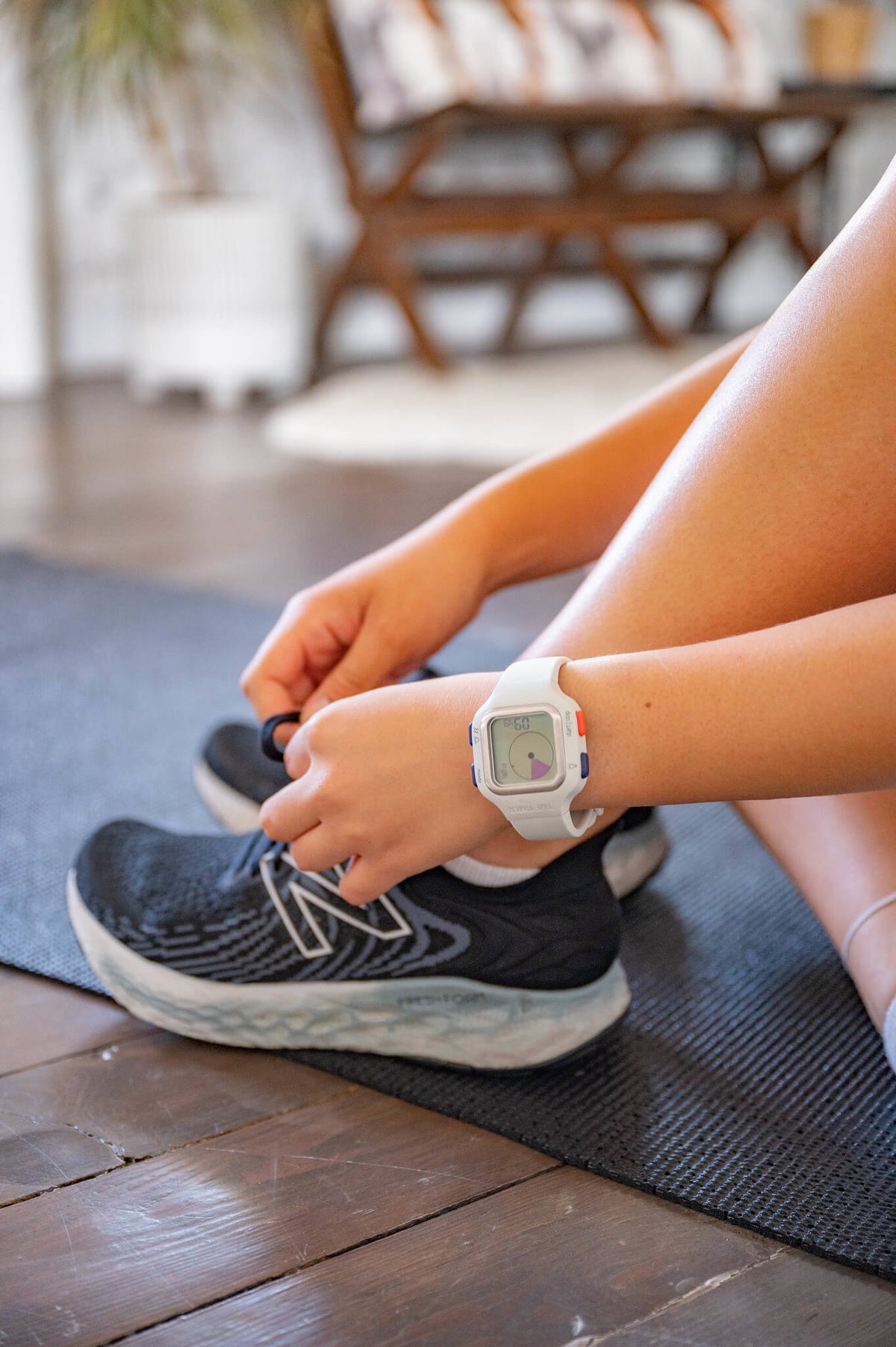 using time timer watch white while tying shoes