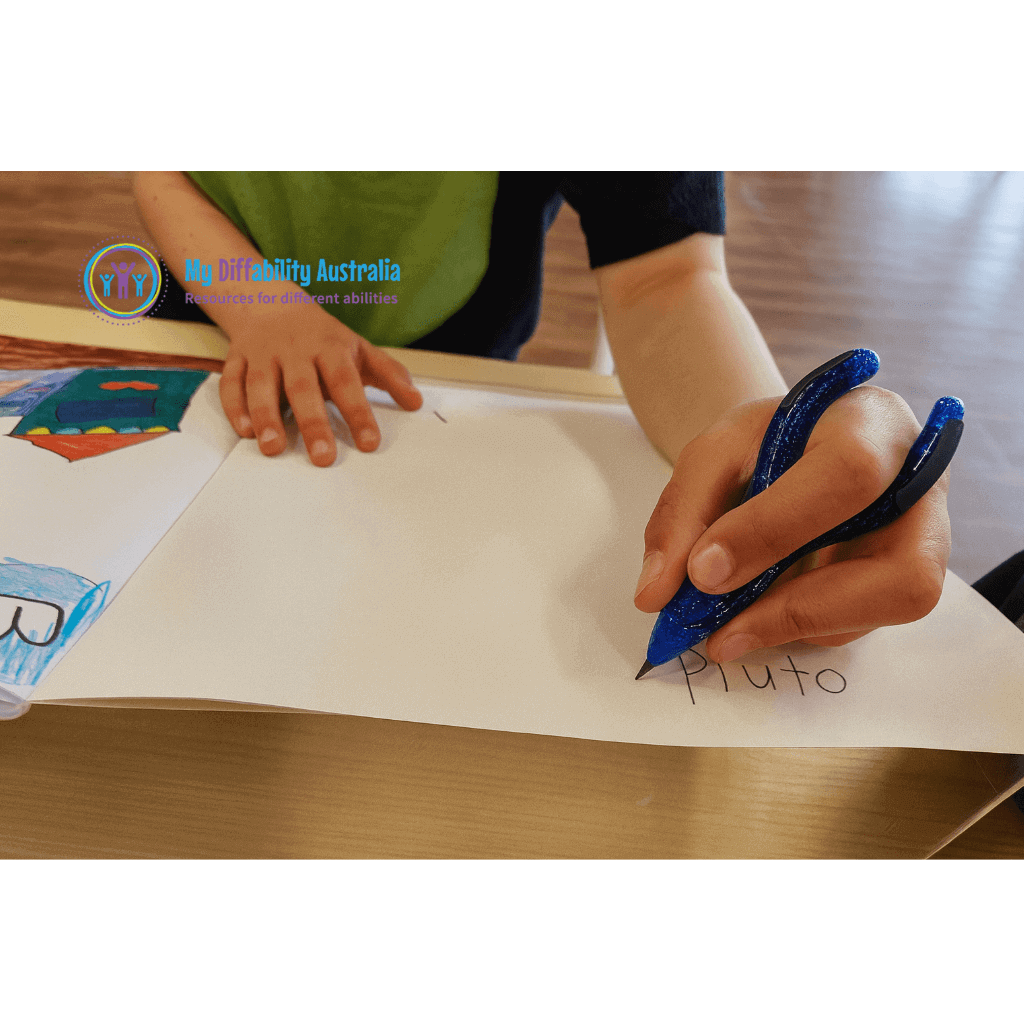 wide angle picture showing a hand holding twist n write pencil in a writing position