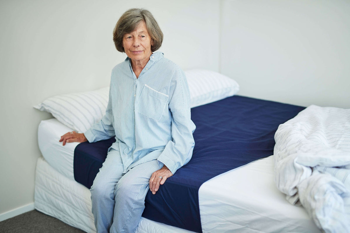 Woman Seating On A Brolly Sheet Navy