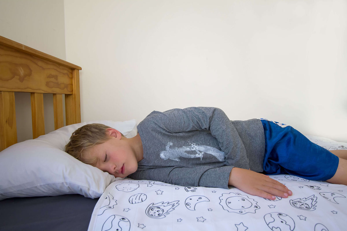 kids sleeping on brolly sheet space