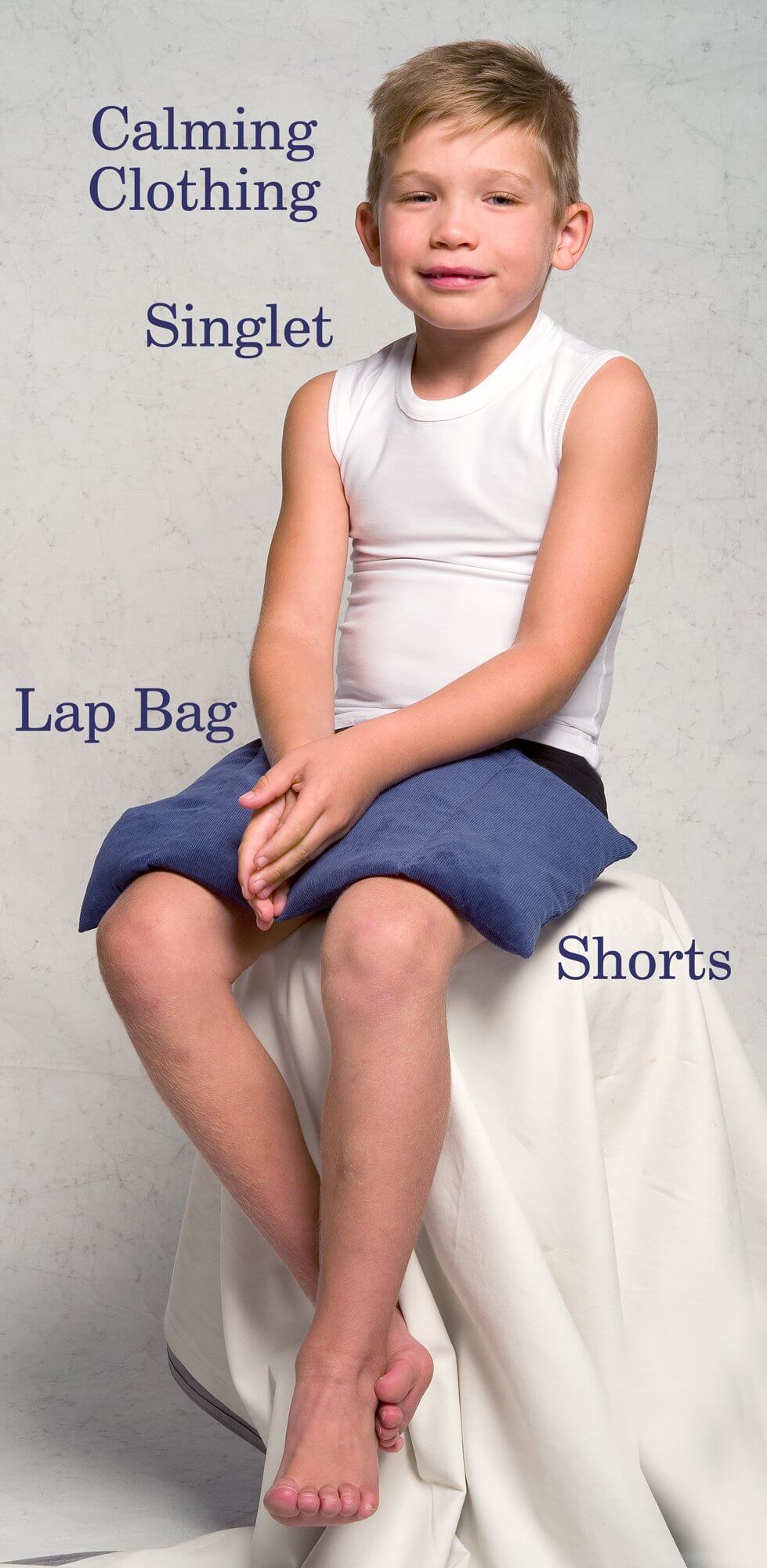Child using a weighted lap bag for calming